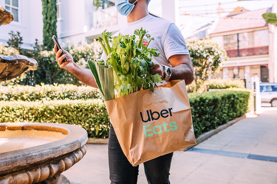Woolworths and Uber Eats partner to deliver first on-demand 